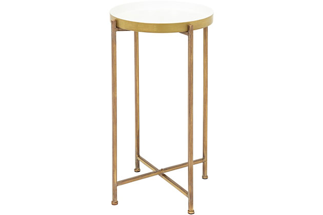 Streamlined and ultra-modern, this accent table is utterly in vogue. Crafted of metal with minimalist-chic styling, the round "tray" tabletop is removable to hold your food and beverages wherever you are. Made of metal | Base with goldtone finish | Tray tabletop with white finish | Handcrafted