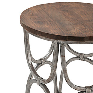 Rustically refined style is shaping up beautifully in this round end table. Its solid wood tabletop with a rich golden brown finish is accented with an aged sturdy steel framework, showcasing a weathered charm that feels right at home.Made of mango wood and steel | Tabletop with golden brown finish | Frame with pewter-tone finish | Indoor use only | No assembly required | Imported