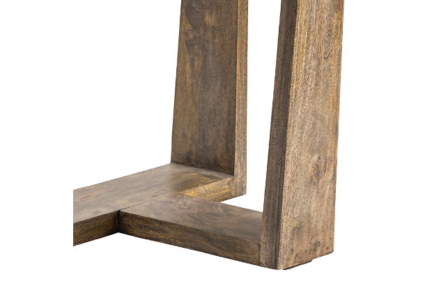 The innovative and bold design of this three-legged end table is sure to add a new look to the sitting area of your home. Made of mango wood, this simple sturdy table will enhance your home with a perfect mix of style and function. Ideal for small space living, this piece instantly improves the look and feel of any decor.Made of mango wood | Brown finish | Indoor use only | Assembly required | Imported