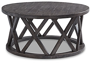 Make it bold and beautiful when you round up the rustic style of the Sharzane coffee table. You'll love the casual look that's delivered through its transitional design. A drum shape with repeated "X" motifs form a unique base and the round top has a planking effect full of detail in a weathered finish. Saw kerf detailing adds notable character to each of the "X" motifs in the table's base—what a plus for creating a relaxed, rustic setting in your living area.Made of solid pine | Distressed with rustic gray weathered finish | Assembly required | Estimated Assembly Time: 30 Minutes