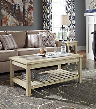 Ultra-clean lines and muted tones are given maximize impact in the Veldar coffee table. Tabletop turns the tables with flush, inlaid ceramic tiles that merge seamlessly with frame's “washed out” finish. Open slat shelf is fresh and functional, providing great space for books and baskets.Assembly required | Open slat shelf | Glazed, patina-style finish | Made of veneers, wood, engineered wood and ceramic tile
