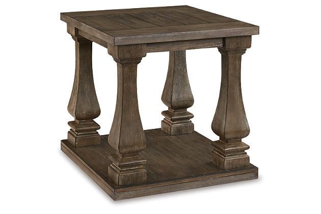 Homey. Hearty. Heavenly hued. Luring with a distressed weathered gray finish and square baluster legs set on a broad lower shelf for great presence, the Johnelle end table is sure to make your homestead feel that much more like home. The look is beautified with elm veneers and a framed and plank-effect tabletop for a richly crafted masterpiece made for years of satisfaction.Made of elm veneers, wood and engineered wood, with cast polyurethane components | Weathered gray finish | Plank-look framed tabletop | Assembly required | Estimated Assembly Time: 15 Minutes