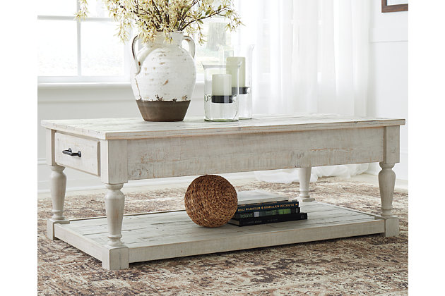 With its distinctive whitewash finish, plank-effect styling and distressed touches that lend a reclaimed sensibility, the Shawnalore coffee table serves up a delightful twist on farmhouse style. Crafted with solid pine wood, this rustically refined coffee table is sure to satisfy for years to come.Made with solid pine wood | Distressed whitewash finish | Industrial pulls with silvery bronze-tone finish | 2 smooth-gliding drawers | Assembly required | Estimated Assembly Time: 15 Minutes