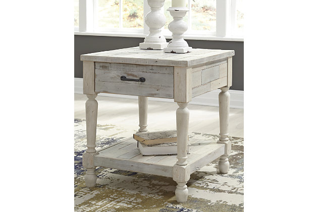 Inspired pieces create inspired spaces. The Shawnalore rectangular end table charms your home with farmhouse style. White textural finish highlights the weatherworn feel of the wood tones and purposeful nail holes. Roomy drawer puts essentials out of sight. Display fashionable books or decor on the planked tabletop and bottom shelf.Made of solid wood | Bronze-tone bar pull | 1 smooth-gliding drawer | 1 shelf | Assembly required | Estimated Assembly Time: 15 Minutes
