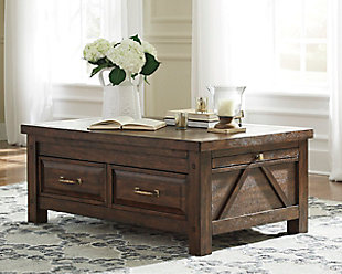 Windville coffee table with storage serves up richly rustic style with added dimension. Dual side pull-out trays expand your surface space, while a pair of smooth-gliding drawers help keep things clutter free. Distinctive elements include mango veneers for dramatic grainy character, along with angled braced sides and antiqued brass-tone pulls for vintage charm.Made of mango veneers, wood and manmade wood | 2 smooth-gliding drawers with dovetail construction and metal ball bearing slides | Antiqued brass-tone hardware | 2 pull-out trays