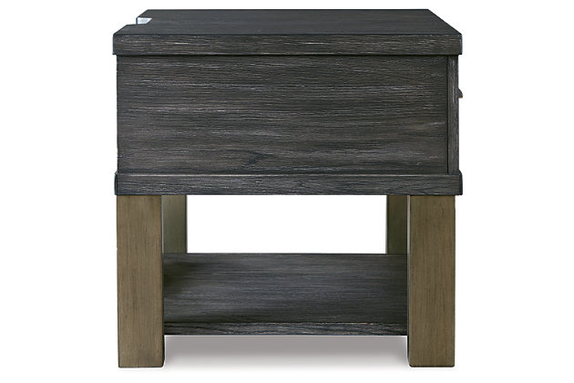 Form truly follows function with the Forleeza end table. With dual USB charging ports, this piece also keeps your devices powered all evening long. Clean and contemporary, this table lends a cool edge to your space while still giving you the practicality you require.Made of acacia wood, oak veneer and engineered wood | Blackened finish with gray undertones and wire-brushed texture | Metal accents with aged bronze-tone texture | AC power supply with 2 USB charging ports | Assembly required