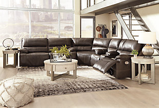 Life is so much better when you can enjoy the pleasure of real leather—at a price to put you at ease. That’s exactly what you get with the Ricmen sectional with power. Thanks to real leather throughout the seating area, you've got a reclining sectional that feels like a million bucks but won’t break the bank. Tailored to those with an eye for contemporary design, this power reclining sectional is dressed to impress with an upscale matte finish, clean-lined divided back tufting, distinctive jumbo stitching and chic pillow top armrests. Perhaps best of all: Easy View™ power adjustable headrests let you recline back and still have a primo view of the TV.Includes 3 pieces: power reclining loveseat, 2 seat power reclining sofa and wedge | Dual-sided recliner | One-touch power control with adjustable positions | Corner-blocked frame with metal reinforced seat | Attached cushions | High-resiliency foam cushions wrapped in thick poly fiber | USB charging port in power control | Easy View™ power adjustable headrests | Loveseat console with storage and 2 cup holders | Leather interior upholstery; vinyl/polyester exterior upholstery | Power cord included; UL Listed | Estimated Assembly Time: 10 Minutes