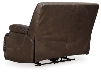 Life is so much better when you can enjoy the pleasure of real leather—at a price to put you at ease. That’s exactly what you get with the Ricmen wide seat power recliner. Thanks to real leather throughout the seating area, you've got a recliner that feels like a million bucks but won’t break the bank. Tailored to suit those with an eye for contemporary design, this power recliner is dressed to impress with an upscale matte finish, clean-lined divided back tufting, distinctive jumbo stitching and chic pillow top armrests. Perhaps best of all: an Easy View™ power adjustable headrest lets you recline back and still have a primo view of the TV.One-touch power control with adjustable positions | Corner-blocked frame with metal reinforced seat | Attached cushions | High-resiliency foam cushions wrapped in thick poly fiber | USB charging port in power control | Easy View™ power adjustable headrest | Extended ottoman for enhanced comfort | Leather interior upholstery; vinyl/polyester exterior upholstery | Power cord included; UL Listed