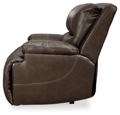 Life is so much better when you can enjoy the pleasure of real leather—at a price to put you at ease. That’s exactly what you get with the Ricmen wide seat power recliner. Thanks to real leather throughout the seating area, you've got a recliner that feels like a million bucks but won’t break the bank. Tailored to suit those with an eye for contemporary design, this power recliner is dressed to impress with an upscale matte finish, clean-lined divided back tufting, distinctive jumbo stitching and chic pillow top armrests. Perhaps best of all: an Easy View™ power adjustable headrest lets you recline back and still have a primo view of the TV.One-touch power control with adjustable positions | Corner-blocked frame with metal reinforced seat | Attached cushions | High-resiliency foam cushions wrapped in thick poly fiber | USB charging port in power control | Easy View™ power adjustable headrest | Extended ottoman for enhanced comfort | Leather interior upholstery; vinyl/polyester exterior upholstery | Power cord included; UL Listed