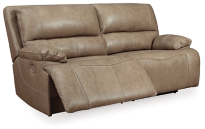 Life is so much better when you can enjoy the pleasure of real leather—at a price to put you at ease. That’s exactly what you get with the Ricmen reclining sectional with power. Thanks to real leather throughout the seating area, you've got a reclining sectional that feels like a million bucks but won’t break the bank. Tailored to those with an eye for contemporary design, this power reclining sectional is dressed to impress with an upscale matte finish, clean-lined divided back tufting, distinctive jumbo stitching and chic pillow top armrests. Perhaps best of all: Easy View™ power adjustable headrests let you recline back and still have a primo view of the TV.Includes 3 pieces: power reclining loveseat, 2 seat power reclining sofa and wedge | Dual-sided recliner | One-touch power control with adjustable positions | Corner-blocked frame with metal reinforced seat | Attached cushions | High-resiliency foam cushions wrapped in thick poly fiber | USB charging port in power control | Easy View™ power adjustable headrests | Loveseat console with storage and 2 cup holders | Leather interior upholstery; vinyl/polyester exterior upholstery | Power cord included; UL Listed | Estimated Assembly Time: 10 Minutes