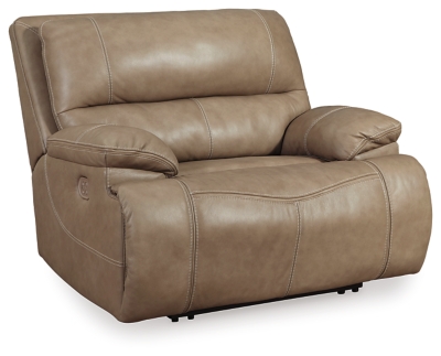 Life is so much better when you can enjoy the pleasure of real leather—at a price to put you at ease. That’s exactly what you get with the Ricmen wide seat power recliner. Thanks to real leather throughout the seating area, you've got a recliner that feels like a million bucks but won’t break the bank. Tailored to suit those with an eye for contemporary design, this power recliner is dressed to impress with an upscale matte finish, clean-lined divided back tufting, distinctive jumbo stitching and chic pillow top armrests. Perhaps best of all: an Easy View™ power adjustable headrest lets you recline back and still have a primo view of the TV.One-touch power control with adjustable positions | Corner-blocked frame with metal reinforced seat | Attached cushions | High-resiliency foam cushions wrapped in thick poly fiber | USB charging port in power control | Easy View™ power adjustable headrest | Extended ottoman for enhanced comfort | Leather interior upholstery; vinyl/polyester exterior upholstery | Power cord included; UL Listed