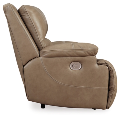 Life is so much better when you can enjoy the pleasure of real leather—at a price to put you at ease. That’s exactly what you get with the Ricmen wide seat power recliner. Thanks to real leather throughout the seating area, you've got a recliner that feels like a million bucks but won’t break the bank. Tailored to suit those with an eye for contemporary design, this power recliner is dressed to impress with an upscale matte finish, clean-lined divided back tufting, distinctive jumbo stitching and chic pillow top armrests. Perhaps best of all: an Easy View™ power adjustable headrest lets you recline back and still have a primo view of the TV.One-touch power control with adjustable positions | Corner-blocked frame with metal reinforced seat | Attached cushions | High-resiliency foam cushions wrapped in thick poly fiber | USB charging port in power control | Easy View™ power adjustable headrest | Extended ottoman for enhanced comfort | Leather interior upholstery; vinyl/polyester exterior upholstery | Power cord included; UL Listed