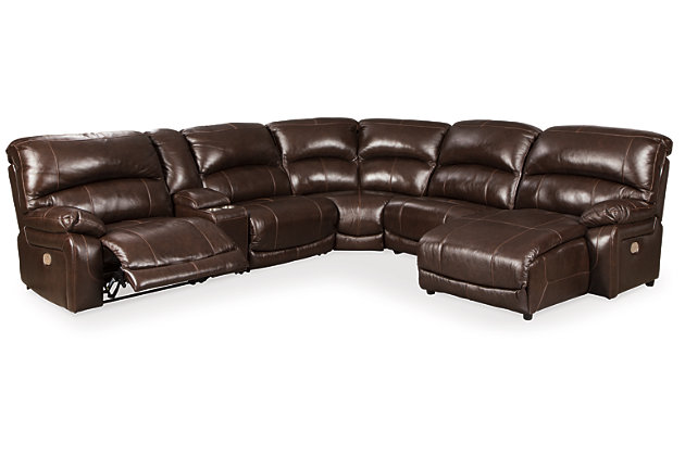 The Hallstrung reclining sectional makes you happy to be at home. Supple leather on the seating area with two-tone color is as comfortable as it is attractive. Faux leather upholstery on the sides and back is easy on the eyes and the wallet. High back design provides the support you need. Keep beverages nearby in the stainless steel cup holders. From the Easy View™ power headrest to the footrests, you're in control of your relaxation. Just plug in your device to the USB charging station and sit back, relax and enjoy your space.Includes 6 pieces: left-arm facing zero wall power recliner, right-arm facing press back power chaise, armless recliner, armless chair, console and wedge | "Left-arm" and "right-arm" describe the position of the arm when you face the piece | Zero wall design requires minimal space between wall and chair back | One-touch power control with adjustable positions | Easy View™ power adjustable headrest | Console with storage and 2 cup holders | USB charging station | Corner-blocked frame with metal reinforced seats | Attached back and seat cushions | High-resiliency foam cushions wrapped in thick poly fiber | Leather interior upholstery; vinyl/polyester exterior upholstery | Power cord included; UL Listed | Extended ottoman for enhanced comfort | Estimated Assembly Time: 55 Minutes