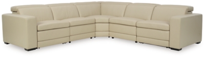 Truly putting high design into recline, the Texline sectional with genuine leather seating area proves that just because you’re a recliner doesn’t mean you have to look like one. Deceptively beautiful, its ultra clean-lined aesthetic is as cool and contemporary as they come. Low-profile back has a super swank look. When you need more support for your head and neck, the press of a button engages the Easy View™ power adjustable headrest, designed to let you lean back and still have a primo view of the TV.Includes 6 pieces: right-arm facing armless power recliner, left-arm facing armless power recliner, left-arm/right-arm facing power arm, 2 armless chairs and wedge | One-touch power control with adjustable positions, Easy View™ adjustable headrest and zero-draw USB plug-in | Zero-draw technology only consumes power when the USB receptacle is in use | Corner-blocked frame with metal reinforced seat | Attached back and seat cushions | Pillow top seats | High-resiliency foam cushions wrapped in thick poly fiber | Extended ottoman for enhanced comfort | Leather interior upholstery; vinyl/polyester exterior upholstery    | Power cord included; UL Listed | Exposed feet with faux wood finish | Zero wall design requires minimal space between wall and chair back | Estimated Assembly Time: 110 Minutes