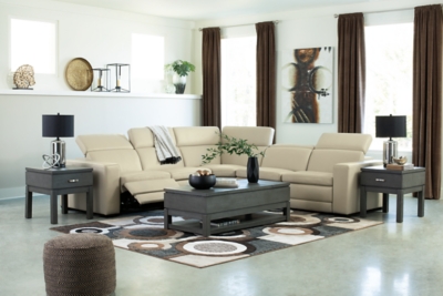 Truly putting high design into recline, the Texline sectional with genuine leather seating area proves that just because you’re a recliner doesn’t mean you have to look like one. Deceptively beautiful, its ultra clean-lined aesthetic is as cool and contemporary as they come. Low-profile back has a super swank look. When you need more support for your head and neck, the press of a button engages the Easy View™ power adjustable headrest, designed to let you lean back and still have a primo view of the TV.Includes 6 pieces: right-arm facing armless power recliner, left-arm facing armless power recliner, left-arm/right-arm facing power arm, 2 armless chairs and wedge | One-touch power control with adjustable positions, Easy View™ adjustable headrest and zero-draw USB plug-in | Zero-draw technology only consumes power when the USB receptacle is in use | Corner-blocked frame with metal reinforced seat | Attached back and seat cushions | Pillow top seats | High-resiliency foam cushions wrapped in thick poly fiber | Extended ottoman for enhanced comfort | Leather interior upholstery; vinyl/polyester exterior upholstery    | Power cord included; UL Listed | Exposed feet with faux wood finish | Zero wall design requires minimal space between wall and chair back | Estimated Assembly Time: 110 Minutes