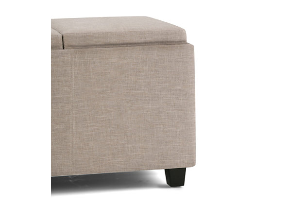 Why sacrifice function for beauty. When you are loo for a tasteful, well-made storage solution and extra seating, look no further than this storage ottoman bench. Covered in natural linen look polyester, it’s extra strong and sturdy with a beautiful stitched exterior, a storage interior and four flip-over trays for easy entertaining or casual dining. Whether you are using it as an eating surface, a storage unit or just to put your feet up, this ottoman is a pretty and practical piece of furniture.Includes storage ottoman bench with 3 flip-over serving trays | Hand constructed of wood and engineered wood | Polyester upholstery with stitching details | Easy assembly required, simply attach feet