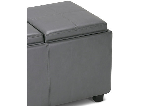 Why sacrifice function for beauty. When you are looking for a tasteful, well-made storage solution and extra seating, look no further than this storage ottoman bench. Made from durable faux leather, it’s extra strong and sturdy with a beautiful stitched exterior, a large storage interior and three flip-over trays for easy entertaining or casual dining. Whether you are using it as an eating surface, a storage unit or just to put your feet up, this ottoman is a pretty and practical piece of furniture.Includes large storage ottoman bench with 3 flip-over serving trays | Made of wood and engineered wood | Faux leather upholstery with stitching details | Easy assembly required, simply attach feet
