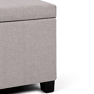 Why sacrifice function for beauty. When you are loo for a tasteful, well-made storage solution and extra seating, look no further than this storage ottoman bench. Covered in faux linen upholstery, it’s extra strong and sturdy with an expertly stitched exterior and a storage interior. Whether you are using it as an eating surface, a storage unit or just to put your feet up, this ottoman is a pretty and practical piece of furniture.Made of wood | Polyester upholstery with stitching details | Easy assembly required, simply attach feet