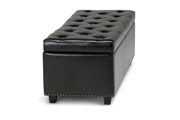 Why sacrifice function for beauty. When you are looking for a tasteful, well-made storage solution and extra seating, look no further than this storage ottoman. Made from durable bonded leather, it’s extra strong and sturdy with a button tufted exterior and a large storage interior. Whether you are using it as an eating surface, a storage unit or just to put your feet up, this ottoman is a pretty and practical piece of furniture.DIMENSIONS: 17.7" d x 48" w x 16" h | Hand constructed using solid wood, engineered wood and high density foam | Upholstered with a durable Midnight Black Faux Leather | Features large interior storage space with child safety hinge to prevent lid slamming | Multi-functional ottoman can be used in bedroom, living room, family room, hallway as an entryway bench, foot stool, accent furniture or provide additional sitting | Transitional design includes tufted diamond detail and nail head trim | Simple assembly; just attach legs | We believe in creating excellent, high quality products made from the finest materials at an affordable price. Every one of our products come with a 1-year warranty and easy returns if you are not satisfied.