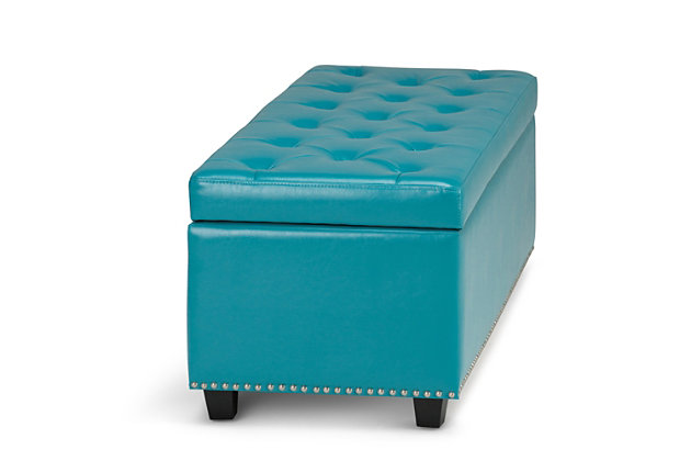 Why sacrifice function for beauty. When you are loo for a tasteful, well-made storage solution and extra seating, look no further than this storage ottoman. Made from durable bonded leather, it’s extra strong and sturdy with a button tufted exterior and a storage interior. Whether you are using it as an eating surface, a storage unit or just to put your feet up, this ottoman is a pretty and practical piece of furniture.DIMENSIONS: 17.7" d x 48" w x 16" h | Hand constructed using solid wood, engineered wood and high density foam | Upholstered with a durable Mediterranean Blue Faux Leather | Features interior storage space with child safety hinge to prevent lid slamming | Multi-functional ottoman can be used in bedroom, living room, family room, hallway as an entryway bench, foot stool, accent furniture or provide additional sitting | Transitional design includes tufted diamond detail and nail head trim | Simple assembly; just attach legs | We believe in creating excellent, high quality products made from the finest materials at an affordable price. Every one of our products come with a 1-year warranty and easy returns if you are not satisfied.