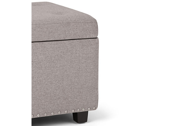 Why sacrifice function for beauty. When you are looking for a tasteful, well-made storage solution and extra seating, look no further than this storage ottoman. Made from linen look upholstery, it’s extra strong and sturdy with a  tufted exterior and a large storage interior. Whether you are using it as an eating surface, a storage unit or just to put your feet up, this ottoman is a pretty and practical piece of furniture.DIMENSIONS: 17.7" d x 48" w x 16" h | Hand constructed using solid wood, engineered wood and high density foam | Upholstered with a durable Cloud Grey Linen Look Fabric | Features large interior storage space with child safety hinge to prevent lid slamming | Multi-functional ottoman can be used in bedroom, living room, family room, hallway as an entryway bench, foot stool, accent furniture or provide additional sitting | Transitional design includes tufted diamond detail and nail head trim | Simple assembly; just attach legs | We believe in creating excellent, high quality products made from the finest materials at an affordable price. Every one of our products come with a 1-year warranty and easy returns if you are not satisfied.