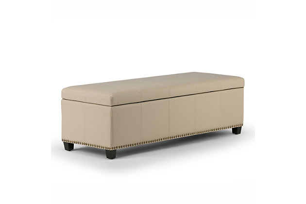 Why sacrifice function for beauty. When you are looking for a tasteful, well-made storage solution and extra seating, look no further than this storage ottoman. Made from durable bonded leather, it’s extra strong and sturdy with a stitched exterior and a large storage interior. Whether you are using it as an eating surface, a storage unit or just to put your feet up, this ottoman is a pretty and practical piece of furniture.Made of wood and engineered wood | Bonded leather upholstery | Nailhead trim | Child safety hinge to prevent slamming | Easy assembly required, simply attach feet