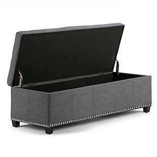 Why sacrifice function for beauty. When you are looking for a tasteful, well-made storage solution and extra seating, look no further than this storage ottoman. Made from durable faux linen, it’s extra strong and sturdy with a stitched exterior and a large storage interior. Whether you are using it as an eating surface, a storage unit or just to put your feet up, this ottoman is a pretty and practical piece of furniture.Made of wood and engineered wood | Polyester upholstery | Nailhead trim | Child safety hinge to prevent slamming | Easy assembly required, simply attach feet