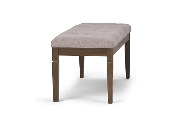Why sacrifice function for beauty. When you are looking for extra seating, look no further than this ottoman bench. Covered in faux linen upholstery, it’s extra strong and sturdy with a cushioned seat and solid wood legs. Whether you are using it in your entryway, living room or bedroom, this bench is a pretty and practical piece of furniture.Made of metal and engineered wood | Polyester upholstery | Solid wood frame and legs | Assembly required