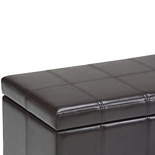 Why sacrifice function for beauty. When you are looking for a tasteful, well-made storage solution and extra seating, look no further than this storage ottoman. Made from durable faux leather, it’s extra strong and sturdy with a stitched exterior and a large storage interior. Whether you are using it as an eating surface, a storage unit or just to put your feet up, this ottoman is a pretty and practical piece of furniture.DIMENSIONS: 33.5” W x 18” D x 16.5”H | Hand constructed using solid wood, engineered wood and high density foam | Upholstered with a durable Tanners Brown PU Faux Leather | Features large interior storage space with child safety hinge to prevent lid slamming | Multi-functional ottoman can be used in bedroom, living room, family room, hallway as an entryway bench, foot stool, accent furniture or provide additional sitting | Transitional design includes stitched detail and nailhead trim at the bottom | Simple assembly; just attach legs | We believe in creating excellent, high quality products made from the finest materials at an affordable price. Every one of our products come with a 1-year warranty and easy returns if you are not satisfied.