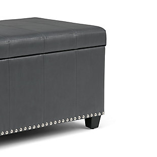 Why sacrifice function for beauty. When you are looking for a tasteful, well-made storage solution and extra seating, look no further than this storage ottoman. Made from durable faux leather, it’s extra strong and sturdy with a stitched exterior and a large storage interior. Whether you are using it as an eating surface, a storage unit or just to put your feet up, this ottoman is a pretty and practical piece of furniture.DIMENSIONS: 33.5” W x 18” D x 16.5”H | Hand constructed using solid wood, engineered wood and high density foam | Upholstered with a durable Stone Grey PU Faux Leather | Features large interior storage space with child safety hinge to prevent lid slamming | Multi-functional ottoman can be used in bedroom, living room, family room, hallway as an entryway bench, foot stool, accent furniture or provide additional sitting | Transitional design includes stitched detail and nailhead trim at the bottom | Simple assembly; just attach legs | We believe in creating excellent, high quality products made from the finest materials at an affordable price. Every one of our products come with a 1-year warranty and easy returns if you are not satisfied.