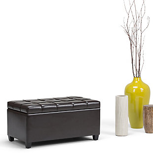 Why sacrifice function for beauty. When you are looking for a tasteful, well-made storage solution and extra seating, look no further than this storage ottoman. Made from durable faux leather, it’s extra strong and sturdy with a button-tufted exterior and a large storage interior. Whether you are using it as an eating surface, a storage unit or just to put your feet up, this ottoman is a pretty and practical piece of furniture.DIMENSIONS: 33.5” W x 18” D x 16.5”H | Hand constructed using solid wood, engineered wood and high density foam | Upholstered with a durable Tanners Brown Faux Leather | Features large interior storage space with child safety hinge to prevent lid slamming | Multi-functional ottoman can be used in bedroom, living room, family room, hallway as an entryway bench, foot stool, accent furniture or provide additional sitting | Transitional design includes tufted stitched detailing | Simple assembly; just attach legs | We believe in creating excellent, high quality products made from the finest materials at an affordable price. Every one of our products come with a 1-year warranty and easy returns if you are not satisfied.