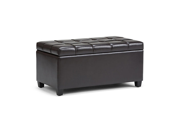 Why sacrifice function for beauty. When you are looking for a tasteful, well-made storage solution and extra seating, look no further than this storage ottoman. Made from durable faux leather, it’s extra strong and sturdy with a button-tufted exterior and a large storage interior. Whether you are using it as an eating surface, a storage unit or just to put your feet up, this ottoman is a pretty and practical piece of furniture.DIMENSIONS: 33.5” W x 18” D x 16.5”H | Hand constructed using solid wood, engineered wood and high density foam | Upholstered with a durable Tanners Brown Faux Leather | Features large interior storage space with child safety hinge to prevent lid slamming | Multi-functional ottoman can be used in bedroom, living room, family room, hallway as an entryway bench, foot stool, accent furniture or provide additional sitting | Transitional design includes tufted stitched detailing | Simple assembly; just attach legs | We believe in creating excellent, high quality products made from the finest materials at an affordable price. Every one of our products come with a 1-year warranty and easy returns if you are not satisfied.