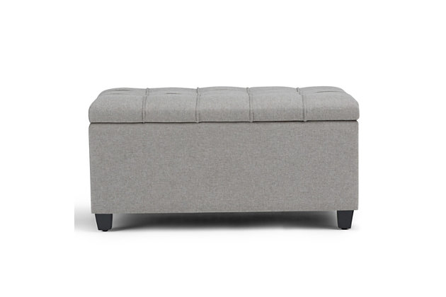 Why sacrifice function for beauty. When you are looking for a tasteful, well-made storage solution and extra seating, look no further than this storage ottoman. Made from durable faux linen upholstery, it’s extra strong and sturdy with a button-tufted exterior and a large storage interior. Whether you are using it as an eating surface, a storage unit or just to put your feet up, this ottoman is a pretty and practical piece of furniture.DIMENSIONS: 33.5” W x 18” D x 16.5”H | Hand constructed using solid wood, engineered wood and high density foam | Upholstered with a durable Dove Grey Linen Look Fabric | Features large interior storage space with child safety hinge to prevent lid slamming | Multi-functional ottoman can be used in bedroom, living room, family room, hallway as an entryway bench, foot stool, accent furniture or provide additional sitting | Transitional design includes tufted stitched detailing | Simple assembly; just attach legs | We believe in creating excellent, high quality products made from the finest materials at an affordable price. Every one of our products come with a 1-year warranty and easy returns if you are not satisfied.