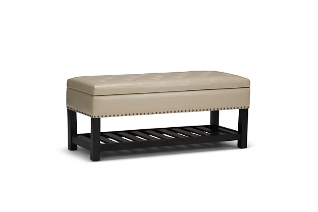 Why sacrifice function for beauty. When you are looking for a tasteful, well-made storage solution and extra seating, look no further than this storage ottoman. Made from durable faux leather, it’s extra strong and sturdy with a button tufted exterior, a large storage interior and a bottom storage area. Whether you are using it in your entryway, living room or bedroom, this ottoman is a pretty and practical piece of furniture.DIMENSIONS: 43.3"W x 19.8"D x 18"H | Hand constructed using solid wood, plywood, foam | Upholstered with a durable Satin Cream Faux Leather | Features lift up lid with child safety hinge to prevent lid slamming, large interior storage and open slat bottom shelf | Multi-functional ottoman can be used in bedroom, living room, family room, hallway as an entryway bench or provide additional sitting | Transitional design includes tufted detail and nail head trim | Assembly required | We believe in creating excellent, high quality products made from the finest materials at an affordable price. Every one of our products come with a 1-year warranty and easy returns if you are not satisfied.