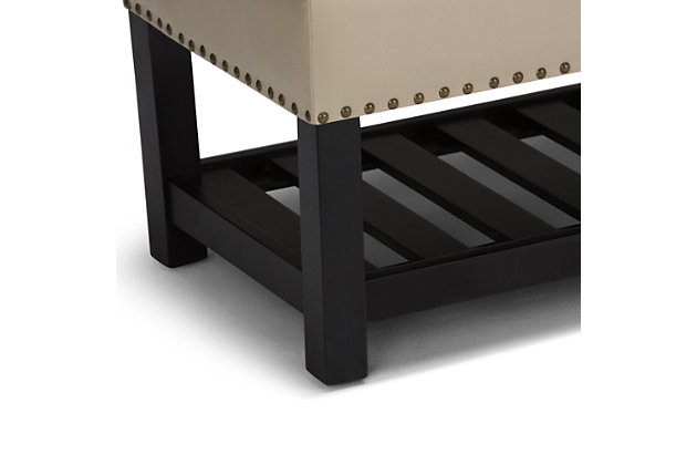 Why sacrifice function for beauty. When you are looking for a tasteful, well-made storage solution and extra seating, look no further than this storage ottoman. Made from durable faux leather, it’s extra strong and sturdy with a button tufted exterior, a large storage interior and a bottom storage area. Whether you are using it in your entryway, living room or bedroom, this ottoman is a pretty and practical piece of furniture.DIMENSIONS: 43.3"W x 19.8"D x 18"H | Hand constructed using solid wood, plywood, foam | Upholstered with a durable Satin Cream Faux Leather | Features lift up lid with child safety hinge to prevent lid slamming, large interior storage and open slat bottom shelf | Multi-functional ottoman can be used in bedroom, living room, family room, hallway as an entryway bench or provide additional sitting | Transitional design includes tufted detail and nail head trim | Assembly required | We believe in creating excellent, high quality products made from the finest materials at an affordable price. Every one of our products come with a 1-year warranty and easy returns if you are not satisfied.