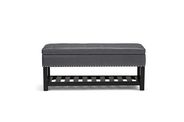 Why sacrifice function for beauty. When you are looking for a tasteful, well-made storage solution and extra seating, look no further than this storage ottoman. Made from durable faux leather, it’s extra strong and sturdy with a button tufted exterior, a large storage interior and a bottom storage area. Whether you are using it in your entryway, living room or bedroom, this ottoman is a pretty and practical piece of furniture.DIMENSIONS: 43.3"W x 19.8"D x 18"H | Hand constructed using solid wood, plywood, foam | Upholstered with a durable Stone Grey Faux Leather | Features lift up lid with child safety hinge to prevent lid slamming, large interior storage and open slat bottom shelf | Multi-functional ottoman can be used in bedroom, living room, family room, hallway as an entryway bench or provide additional sitting | Transitional design includes tufted detail and nail head trim | Assembly required | We believe in creating excellent, high quality products made from the finest materials at an affordable price. Every one of our products come with a 1-year warranty and easy returns if you are not satisfied.