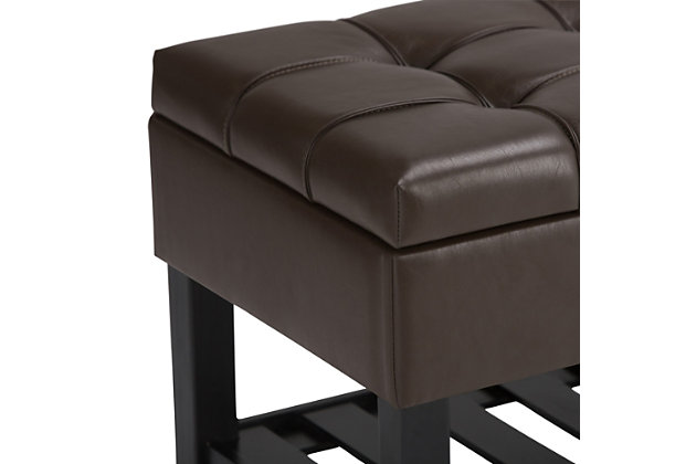 Why sacrifice function for beauty. When you are looking for a tasteful, well-made storage solution and extra seating, look no further than this storage ottoman. Made from durable faux leather, it’s extra strong and sturdy with a stitched and tufted exterior, a large storage interior and a bottom storage area. Whether you are using it in your entryway, living room or bedroom, this ottoman is a pretty and practical piece of furniture.DIMENSIONS: 43.5"W x 17"D x 18.5"H | Hand constructed using solid wood, plywood, foam | Upholstered with a durable Chocolate Brown PU Faux Leather | Features lift up lid with child safety hinge to prevent lid slamming, large interior storage and open slat bottom shelf | Multi-functional ottoman can be used in bedroom, living room, family room, hallway as an entryway bench or provide additional sitting | Transitional design includes tufted and top stitching detail | Assembly required | We believe in creating excellent, high quality products made from the finest materials at an affordable price. Every one of our products come with a 1-year warranty and easy returns if you are not satisfied.