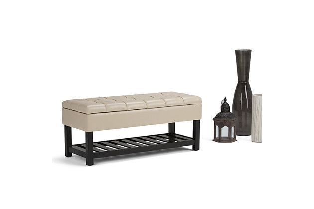 Why sacrifice function for beauty. When you are looking for a tasteful, well-made storage solution and extra seating, look no further than this storage ottoman. Made from durable faux leather, it’s extra strong and sturdy with a stitched and tufted exterior, a large storage interior and a bottom storage area. Whether you are using it in your entryway, living room or bedroom, this ottoman is a pretty and practical piece of furniture.DIMENSIONS: 43.5"W x 17"D x 18.5"H | Hand constructed using solid wood, plywood, foam | Upholstered with a durable Satin Cream PU Faux Leather | Features lift up lid with child safety hinge to prevent lid slamming, large interior storage and open slat bottom shelf | Multi-functional ottoman can be used in bedroom, living room, family room, hallway as an entryway bench or provide additional sitting | Transitional design includes tufted and top stitching detail | Assembly required | We believe in creating excellent, high quality products made from the finest materials at an affordable price. Every one of our products come with a 1-year warranty and easy returns if you are not satisfied.