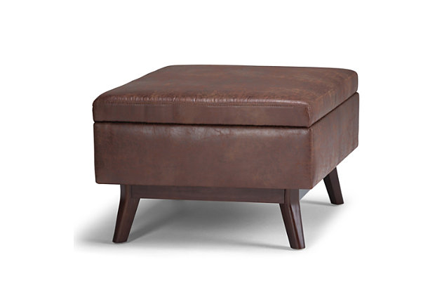 Why sacrifice function for beauty. When you are looking for a tasteful, well-made storage solution and extra seating, look no further than this storage ottoman. Made from durable leather look upholstery, it’s extra strong and sturdy with an expertly tailored exterior and a large storage interior. Whether you are using it as an eating surface, a storage unit or just to put your feet up, this ottoman is a pretty and practical piece of furniture.Made of wood | Faux leather upholstery | Child safety hinge prevents slamming | Easy assembly required, simply attach feet