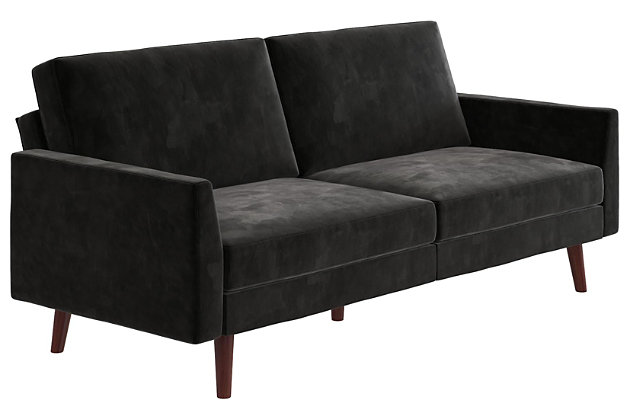 Designed with a soft velvet upholstery, slim track arms and slanted solid wood legs, this futon is a modern dream come true. Not only is it right on trend, but it's also the multi-functional piece you never knew you needed, but now can’t live without. A split-back design allows you to independently recline the backrests into multiple positions. Simply push or pull your futon to instantly convert it into a lounger or bed. The sturdy wood frame and independently encased coils provide comfort and support to accommodate your overnight guests.Sturdy wood frame | Black velvet upholstery | Foam cushions | Holds up to 600 pounds | Assembly required