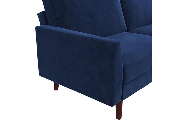 Designed with a soft velvet upholstery, slim track arms and slanted solid wood legs, this futon is a modern dream come true. Not only is it right on trend, but it's also the multi-functional piece you never knew you needed, but now can’t live without. A split-back design allows you to independently recline the backrests into multiple positions. Simply push or pull your futon to instantly convert it into a lounger or bed. The sturdy wood frame and independently encased coils provide comfort and support to accommodate your overnight guests.Sturdy wood frame | Blue upholstery | Foam cushions | Holds up to 600 pounds | Assembly required