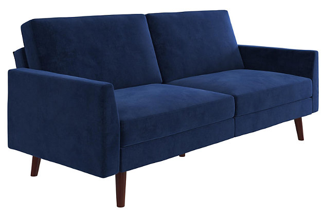Designed with a soft velvet upholstery, slim track arms and slanted solid wood legs, this futon is a modern dream come true. Not only is it right on trend, but it's also the multi-functional piece you never knew you needed, but now can’t live without. A split-back design allows you to independently recline the backrests into multiple positions. Simply push or pull your futon to instantly convert it into a lounger or bed. The sturdy wood frame and independently encased coils provide comfort and support to accommodate your overnight guests.Sturdy wood frame | Blue upholstery | Foam cushions | Holds up to 600 pounds | Assembly required
