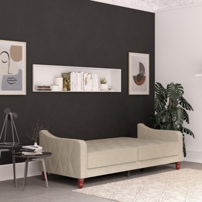 The Novogratz Vintage Tufted Split Back Futon is the best way to make a style statement in your home! In fact, this sofa does everything for you. Made with a robust wooden frame, its elegant design pops in adventurous colors that will make sure to leave a lasting impression. The split-back feature is ideal when looking for functionality: it can be independently reclined to multiple positions, which allows you to sit, lounge and even sleep! Upholstered in soft velvet with diamond-tufted seat, cushion and arms, it has Victorian style legs that add the last touch. Pair it with the Novogratz Vintage Tufted armchair and/or ottoman to achieve a complete look and bring on the fun!Elegant vintage design with delicate wing back arms and victorian-style legs | Made with a robust wooden frame and upholstered in soft velvet with diamond-tufted seat, cushion and arms | Split-back can be independently reclined to multiple positions. Perfect for sitting, lounging, and sleeping | Back legs provide additional support in sleep position and stow away when the futon is in sitting position