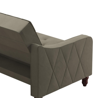 The Novogratz Vintage Tufted Split Back Futon is the best way to make a style statement in your home! In fact, this sofa does everything for you. Made with a robust wooden frame, its elegant design pops in adventurous colors that will make sure to leave a lasting impression. The split-back feature is ideal when looking for functionality: it can be independently reclined to multiple positions, which allows you to sit, lounge and even sleep! Upholstered in soft velvet with diamond-tufted seat, cushion and arms, it has Victorian style legs that add the last touch. Pair it with the Novogratz Vintage Tufted armchair and/or ottoman to achieve a complete look and bring on the fun!Elegant vintage design with delicate wing back arms and victorian-style legs | Made with a robust wooden frame and upholstered in soft velvet with diamond-tufted seat, cushion and arms | Split-back can be independently reclined to multiple positions. Perfect for sitting, lounging, and sleeping | Back legs provide additional support in sleep position and stow away when the futon is in sitting position