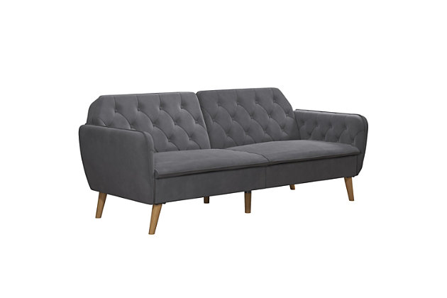 The Novogratz Tallulah Memory Foam Futon is exactly what you need and more! Bringing elegance and sophistication into your home with its vintage silhouette, rounded lines and button-tufted details. Designed with a soft velvet upholstery, this piece of furniture is both compact and multi-functional. Made with a sturdy wood frame, the Tallulah Memory Foam Futon is designed to offer nothing but superior comfort! The seat cushions are filled with high-density foam and responsive memory foam that will cradle your body to help relieve pressure points while you are watching TV or ta a much needed afternoon nap. The backrest features a split-back design that can be independently reclined to convert between multiple positions: sitting, lounging and sleeping. In other words, this means that you will now have an extra bed for overnight guests! Available in multiple colors, the Novogratz Tallulah Memory Foam Futon is finished with slanted wooden legs to add a last touch of chic style!Classic vintage design in velvet upholstery with button-tufted arms and back and wooden legs | Made on a sturdy wood frame with filling made of high-density foam and memory foam for ultimate comfort | Multi-functional design. The back can be reclined to lounging and sleeping position | Available in blue, grey, green and pink velvet. Ships in one box and it is easy to assemble | Tapered wood legs in natural finish | Ideal for sitting, lounging and sleeping | Multi-position back for optimal comfort | Converts easily from sofa to sleeper | Assembly required