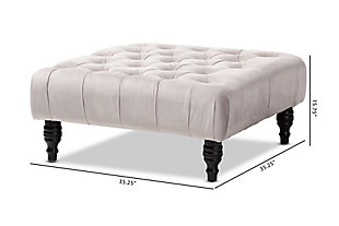 This ottoman complements your sense of style in a cool, contemporary way. A versatile accent piece, the ottoman doubles as a footrest or impromptu coffee table as the need arises. Upholstered in rich velvet with button tufted accents, the elegantly turned legs add classic appeal.Eucalyptus wood frame | Gray polyester velvet upholstery | Button tufted | Black finished legs with non-marking feet | No assembly required