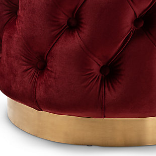 This modern and glamourous ottoman has luxury written all over it. From the plush cushion padded with foam and upholstered in a rich, soft to the touch velvet fabric, to the brushed goldtone finish on the base. The all-over button tufting highlights the subtle sheen of the velvet creating a decadently cool and comfortable appeal as a footstool or extra seating in your home.Engineered wood and stainless-steel frame | Burgundy polyester velvet upholstery | Button tufted | Brushed goldtone metal base | No assembly required