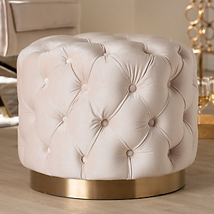 This modern and glamourous ottoman has luxury written all over it. From the plush cushion padded with foam and upholstered in a rich, soft to the touch velvet fabric, to the brushed goldtone finish on the base. The all-over button tufting highlights the subtle sheen of the velvet creating a decadently cool and comfortable appeal as a footstool or extra seating in your home.Engineered wood and stainless-steel frame | Light beige polyester velvet upholstery | Button tufted | Brushed goldtone metal base | No assembly required