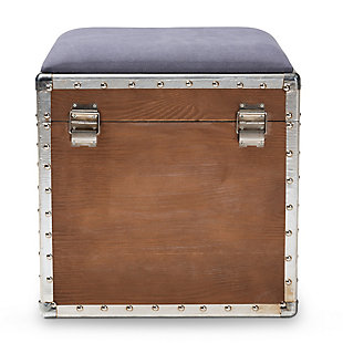 Featuring a striking mix of textures, this ottoman adds character to any space. Cool rivet detailing and an upholstered seat that can be flipped up to reveal an inner storage compartment add a level of interest and abundant practicality. Modeled after vintage storage trunks and accented with silver metal handles, an imitation lock and an antique-inspired inscription, this is sure to be a conversation piece in any room of your home.Made of engineered wood | Light brown finish | Silvertone accents | Gray polyester upholstered seat cushion | Weight capacity 100 pounds | No assembly required