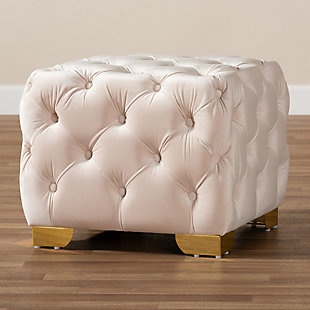 Raise your standard of living with this ottoman upholstered in a soft, sumptuous velvet fabric. Reserved exclusively for those with a penchant for high-glam home decor, this ultra-chic ottoman is dressed to impress with all over button tufting and lustrous goldtone-finished metal legs that simply works. Easy-on-the-eyes and alluring to the touch, this decidedly elegantly and versatile ottoman can be used as a coffee table, footstool or as extra seating for guests.Engineered wood frame | Light beige velvet upholstery | No assembly required